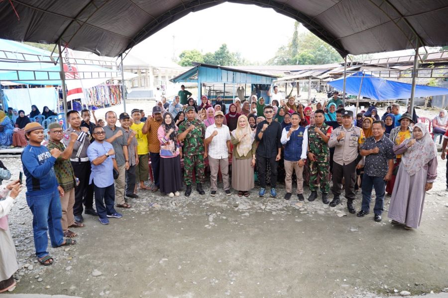 Pedagang Pasar Kapidi Syukuran Juara I Nasional Pasar Pangan Aman Berbasis Komunitas